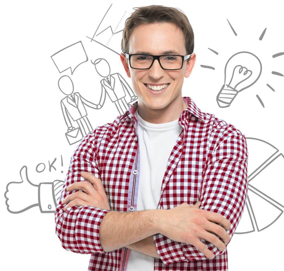 Confident young man with glasses smiling, standing in front of creative sketches.