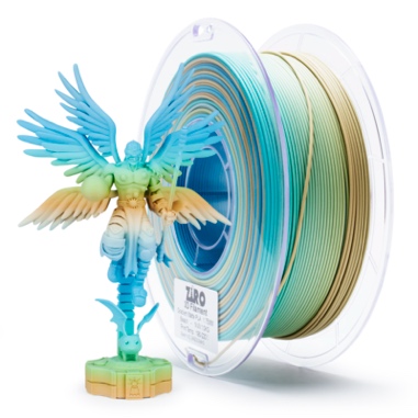 3D printer filament spool with a colorful printed phoenix model.