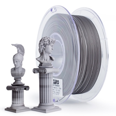3D printer filament spool with two detailed bust sculptures.