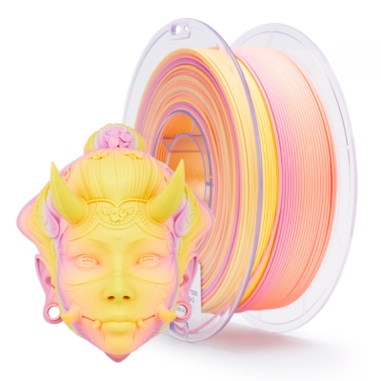 Colorful dragon-themed 3D printer filament spool with orange, pink, and yellow hues.