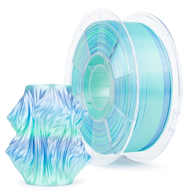 A spool of translucent filament next to a 3D-printed object.