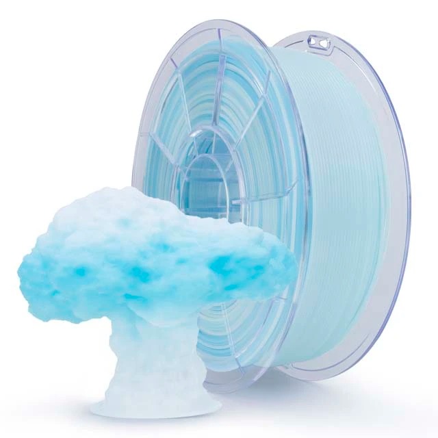 A cloud-shaped 3D print with a spool of translucent filament.