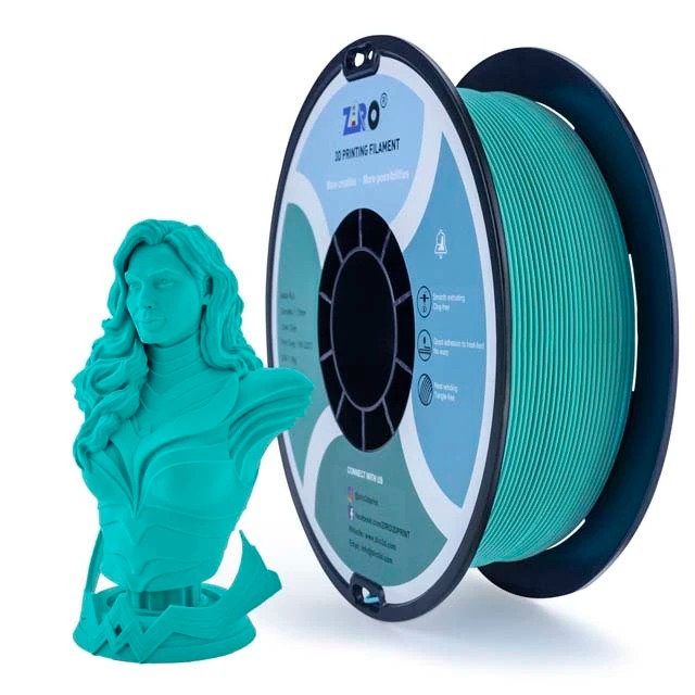 3D printer filament spool and a turquoise 3D printed bust.